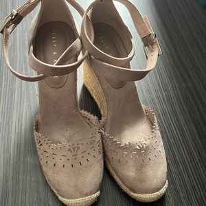 Adorable and virtually brand new closed toe espadrilles with ankle straps.